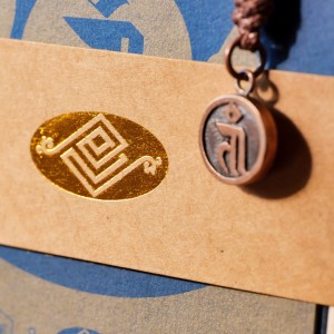 Colgante tibetano de bronce con sílaba Da de Tara Verde - Khyenle