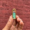 Colgante budista de Tara Verde en Gawu – Talismán de compasión