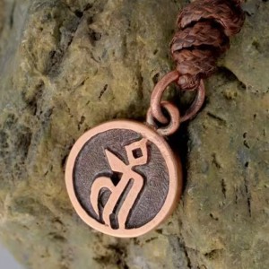 Colgante tibetano de bronce con sílaba Da de Tara Verde Khyenle