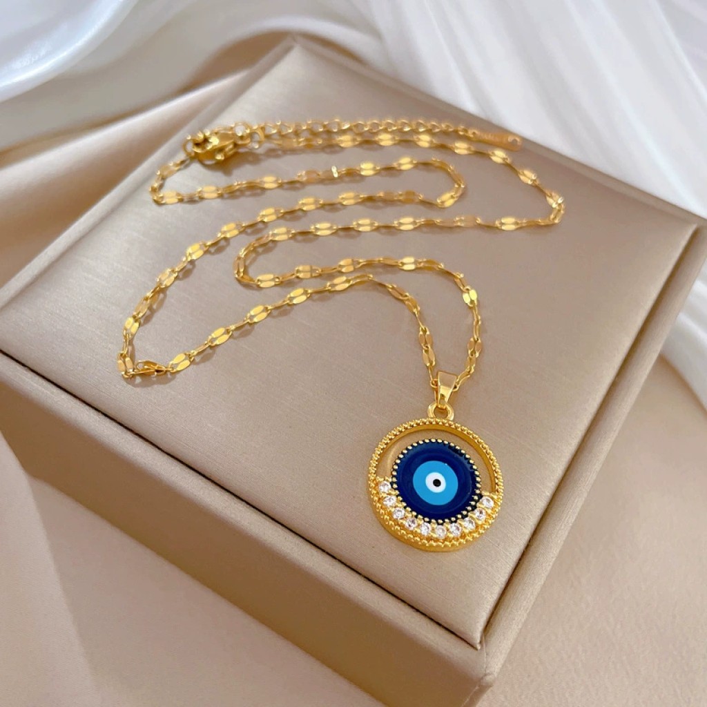 Colgante ojo turco dorado con incrustaciones nazar protector Xinjiang Plaza