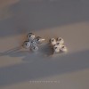 Pendientes de plata con flor cuatro pétalos pulido o mate