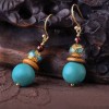 Pendientes tibetanos de bola azules inspirados en el Himalaya