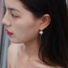 Pendientes de plata con esfera farolillo tejida y cadena alargada joyería nuosu
