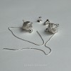 Pendientes de plata con esfera tejida y cadena alargada joyería nuosu